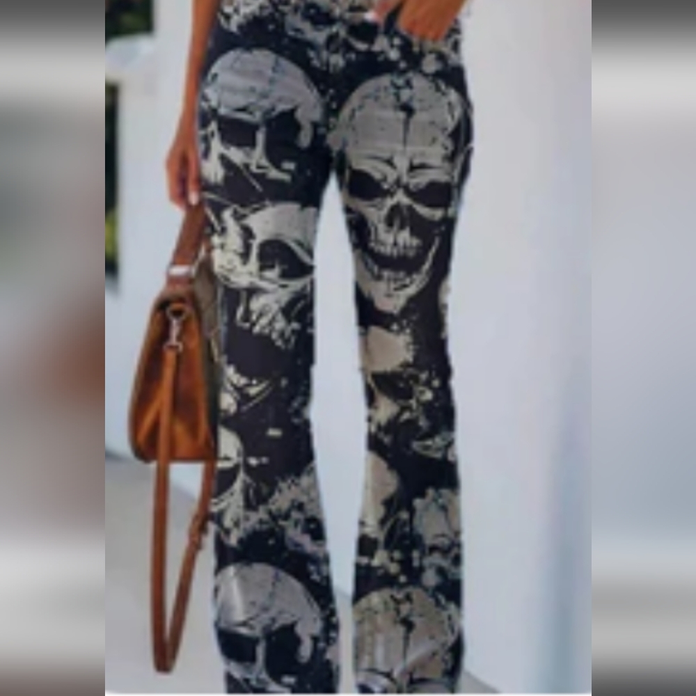 NWOT skull print black boot cut pants 2 front pockets  satin like feel